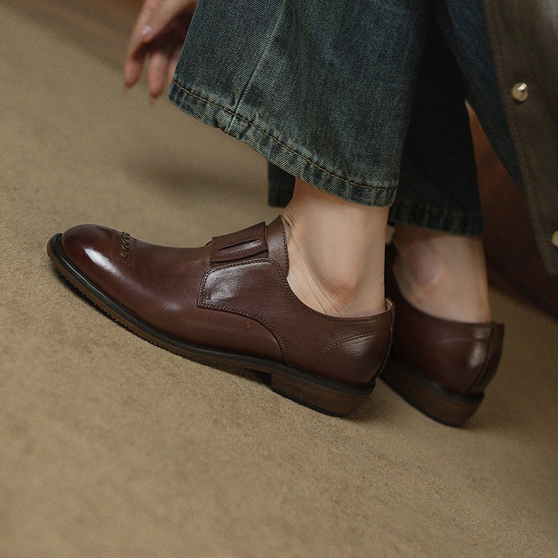 Retro Cowhide Round Toe Rivet Decorated Low Heel Loafers in Black/Brown