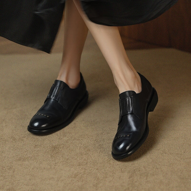 Retro Cowhide Round Toe Rivet Decorated Low Heel Loafers in Black/Brown